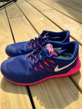 Nike Women’s Navy Blue and Hot Pink Athletic Running Shoes. Nike Free 5.0